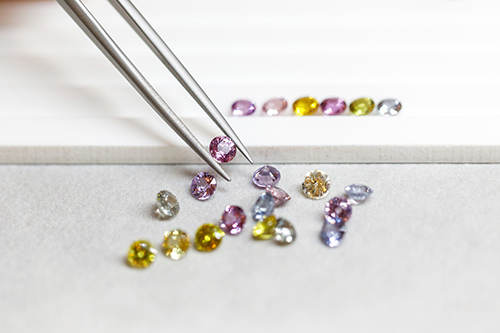 Sorting through gemstones Image