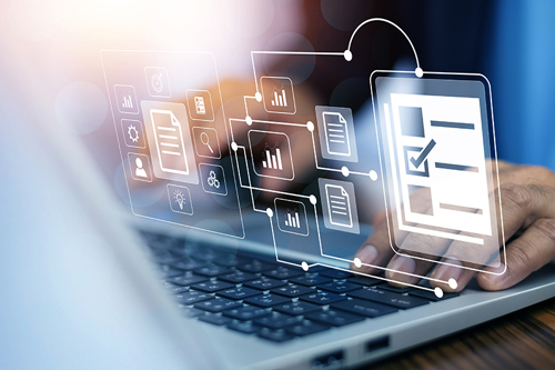 Person typing on laptop image